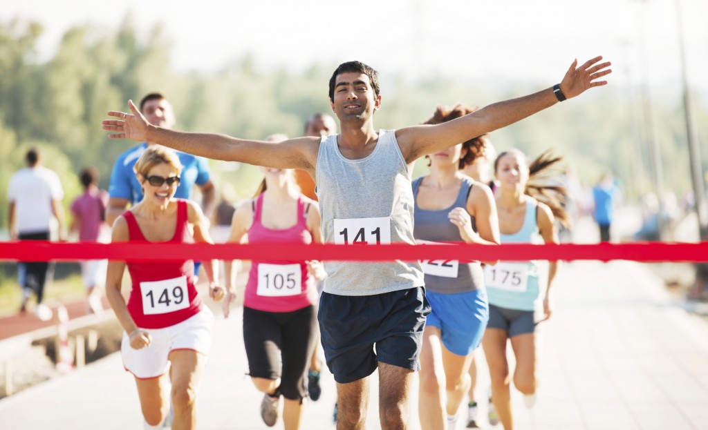 A group of runners in a cross country race. ManSpace Magazine